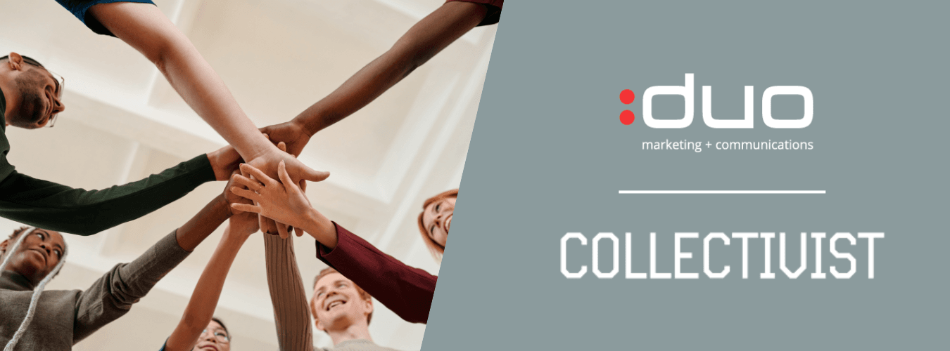 A group of people joining hands to represent a network of cooperation.